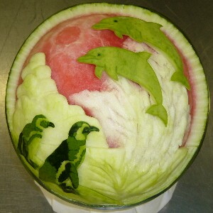 Watermelon Carving: Dolphins and Penguins.