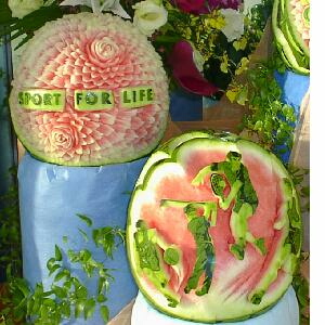 watermelon sculpture: A flower, a sport.